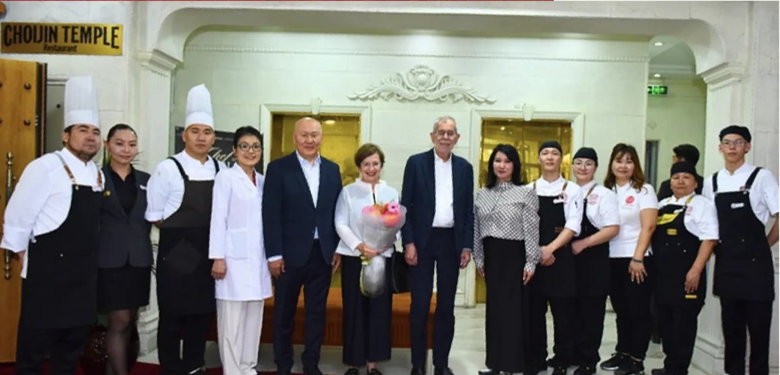 Choijin Temple team with guests during Best Eatery recognition