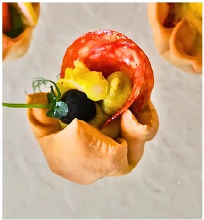 Pepperoni, chick pea hummus, pickled cauliflower from the Choijin finger food special set menu.
